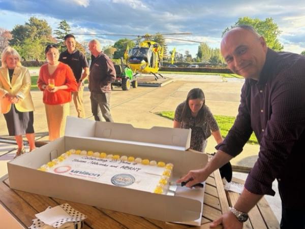 Unisons Jaun Park cuts the cake
